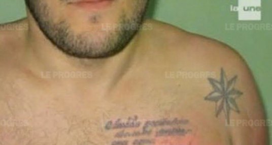 le-jeune-homme-fait-partie-de-l-organisation-criminelle-georgienne-des-vori-v-zakone-reconnaissable-a-ses-tatouages-photo-d-illustration-d-r-1448414175