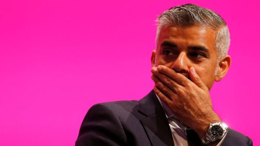 shadow-justice-minister-sadiq-khan-reacts-as-he-listens-to-yvette-cooper-britain-s-opposition-labour-party-s-shadow-home-secretary-speaks-at-the-party-s-conference-in-manchester_5413579.jpg